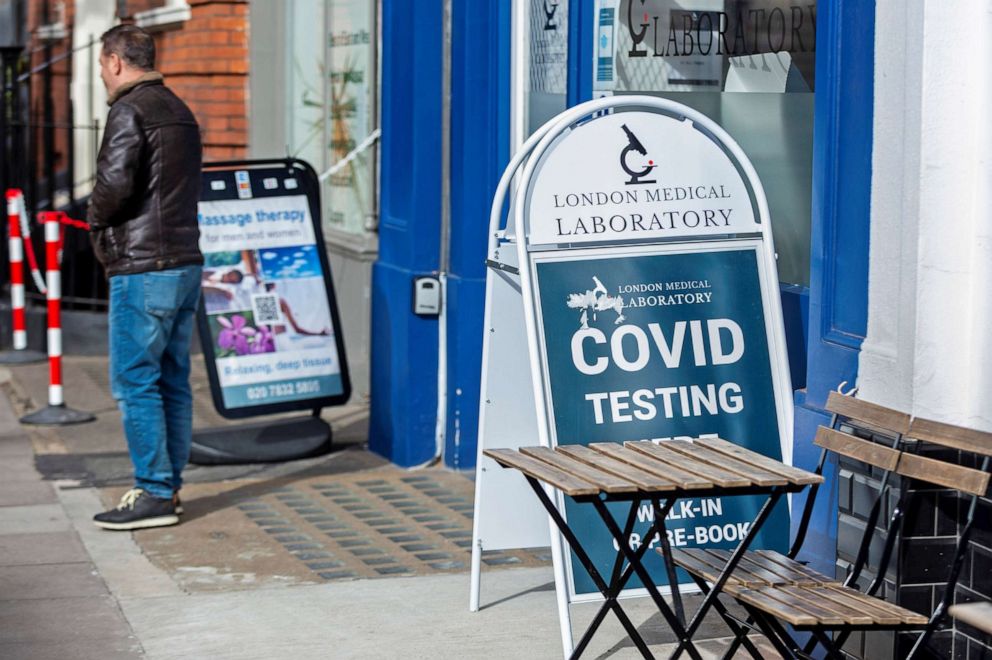 PHOTO: A person stands outside a COVID-19 testing center in London, Feb. 21, 2022.