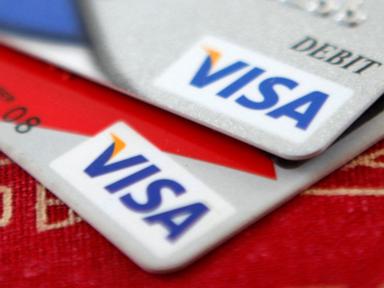 Americans' credit card debt reaches new record high: Federal Reserve