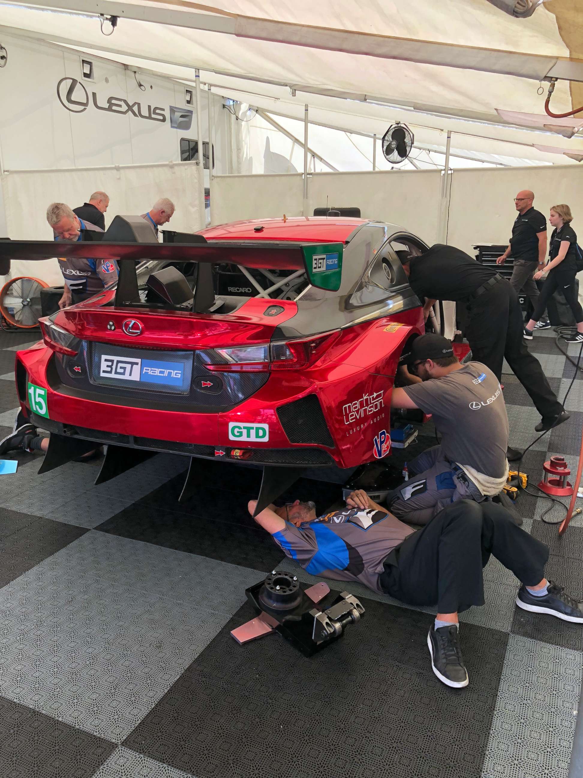 PHOTO: The crew preps one of the cars before a race at Lime Rock Park in Lakeville,  Conn., July 21, 2018.