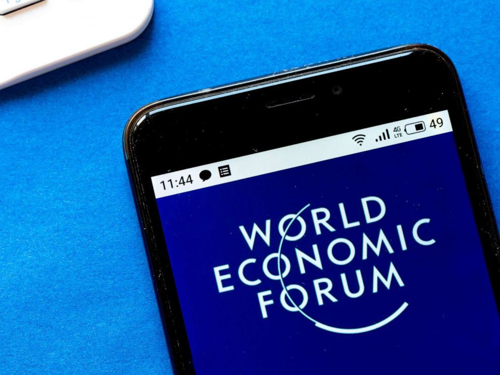 PHOTO: A World Economic Forum logo is seen displayed on a smartphone in a photo illustration. 