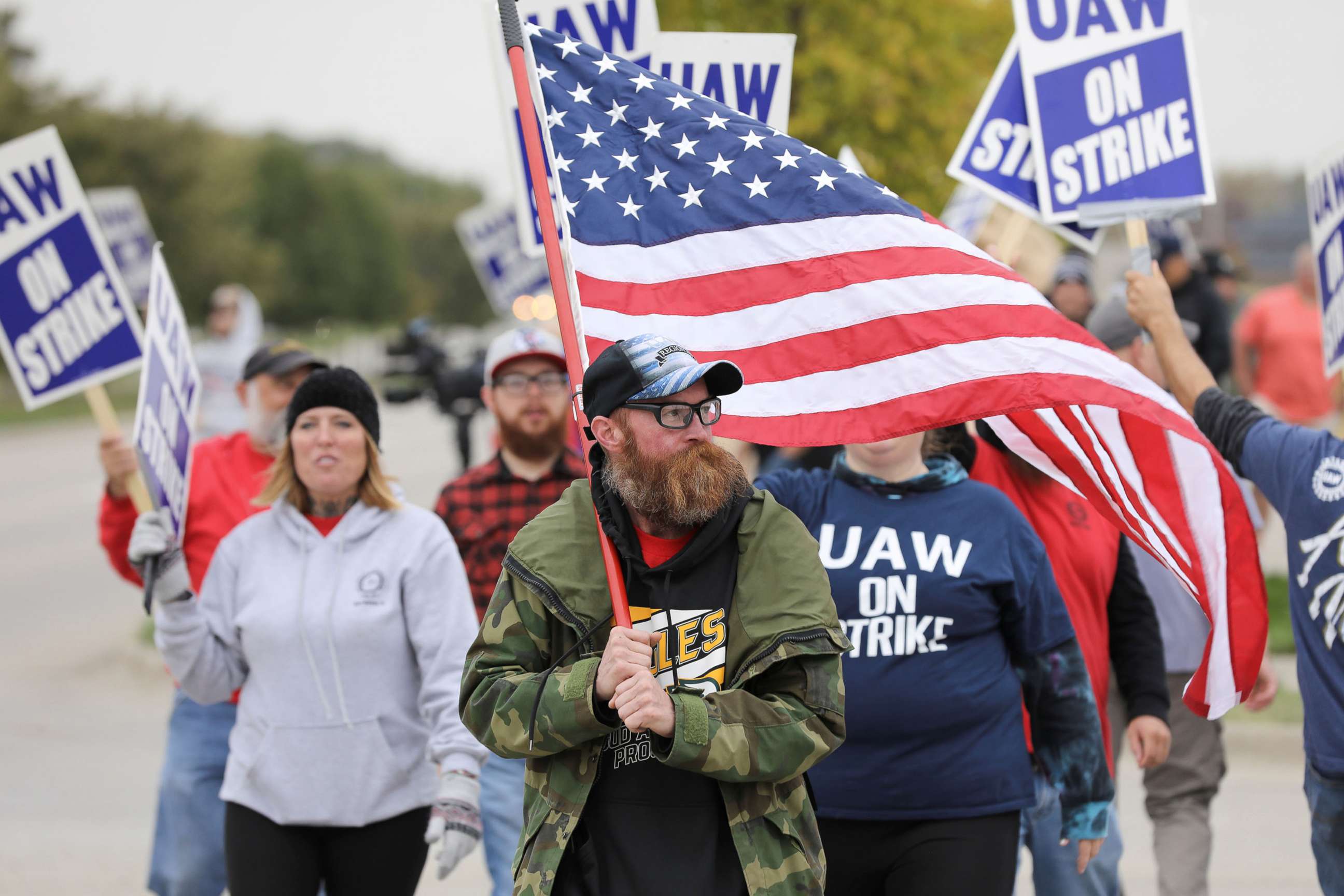 PHOTO: Striking members of the United Auto Workers (UAW) picket at the Deere plant in Ankeny, Iowa, Oct. 20, 2021.