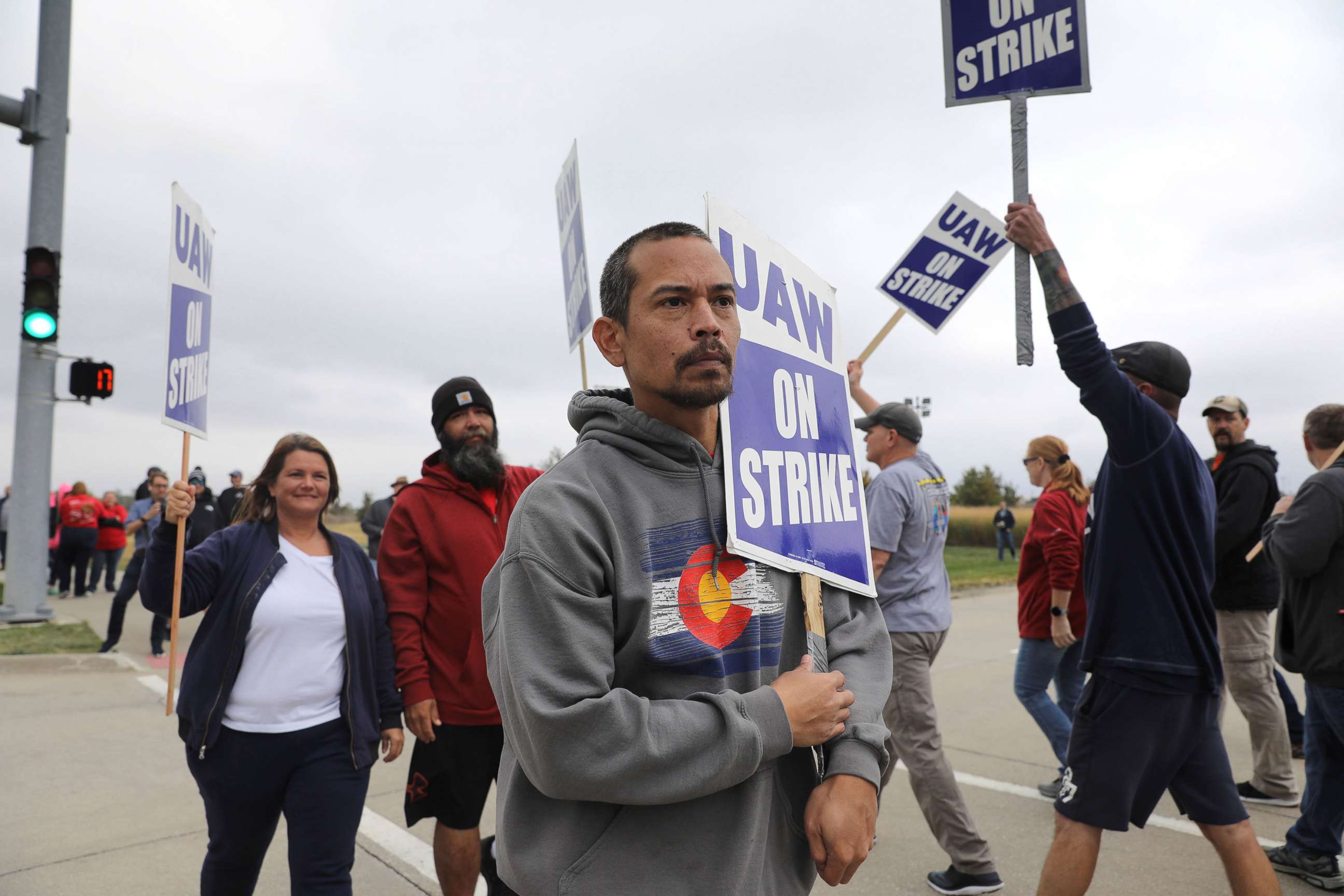 PHOTO: Striking members of the United Auto Workers (UAW), including Mark Allen of Des Moines, picket outside the Deere plant in Ankeny, Iowa, Oct. 20, 2021.