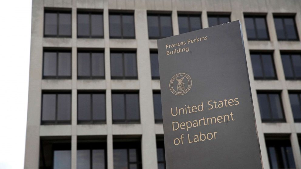PHOTO: A sign stands outside the Department of Labor's headquarters in Washington, D.C., May 6, 2020.