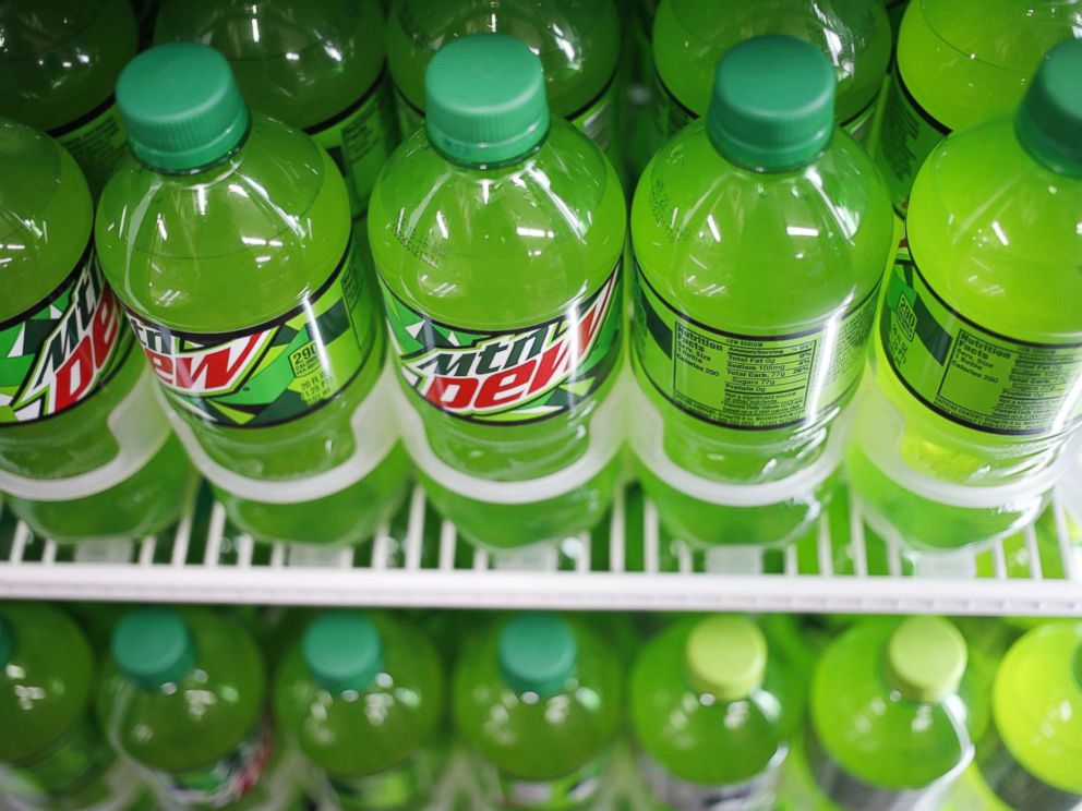 PHOTO: Bottles of PepsiCo Inc. Mountain Dew brand soda are displayed for sale inside a convenience store in Bagdad, Ky.,Feb. 11, 2018.