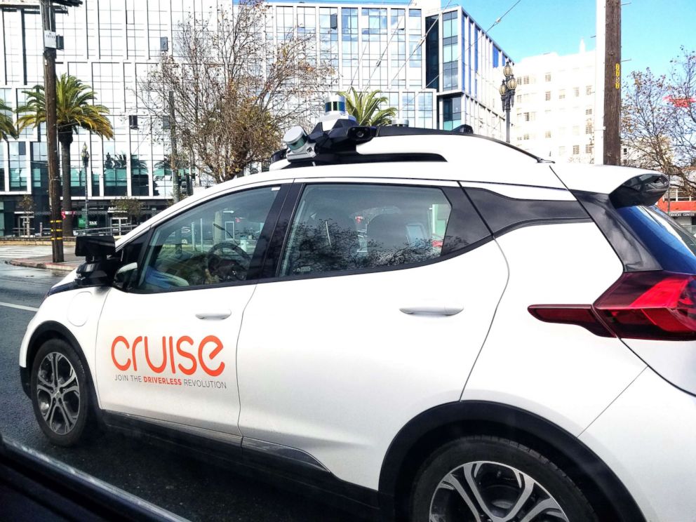 PHOTO: A side view of a driverless car from technology company Cruise Automation navigating the streets of San Francisco, with LIDAR and other devices visible in December 2018.