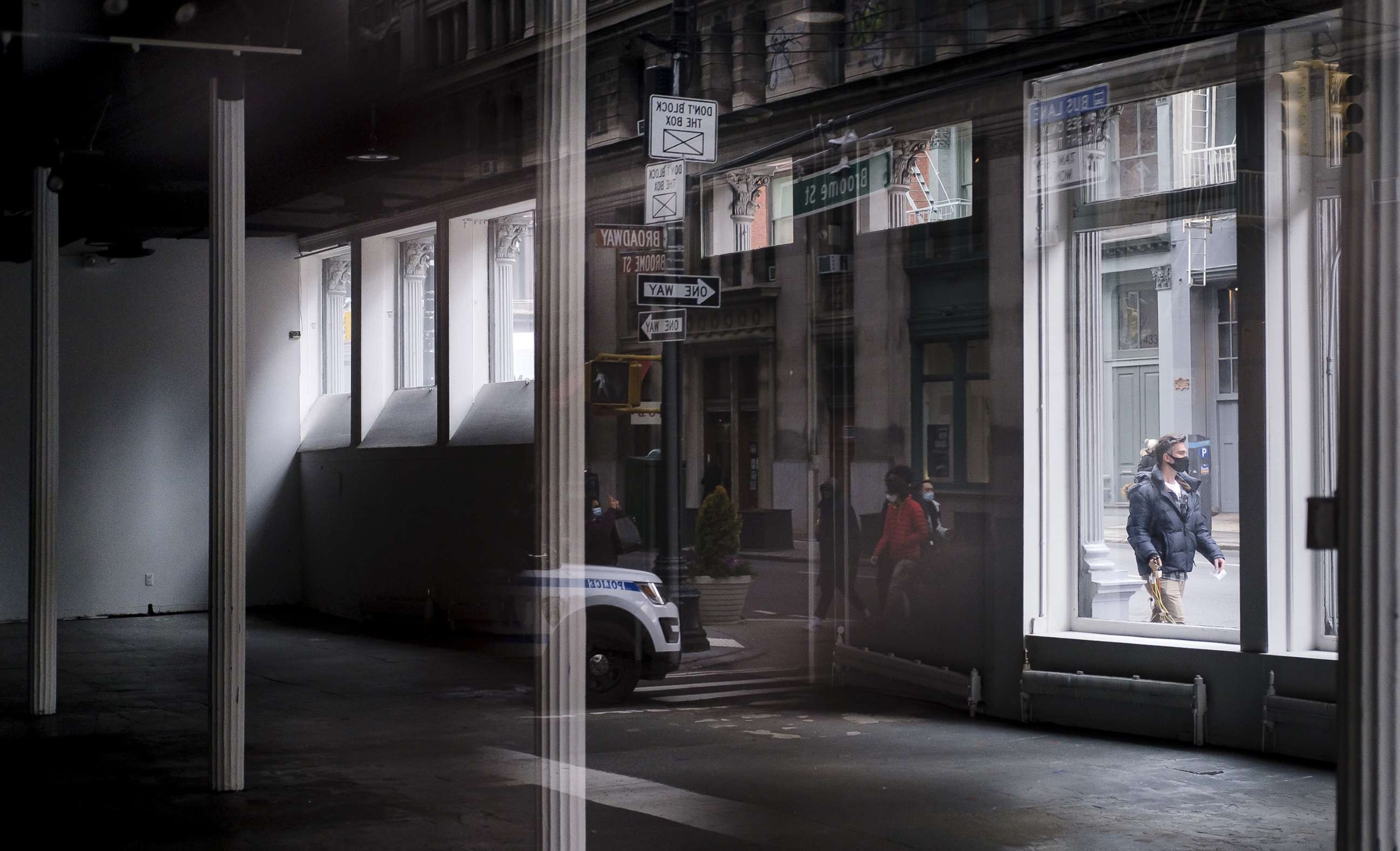 PHOTO: A pedestrian walks past a closed retail store in New York City, Jan. 8, 2021.