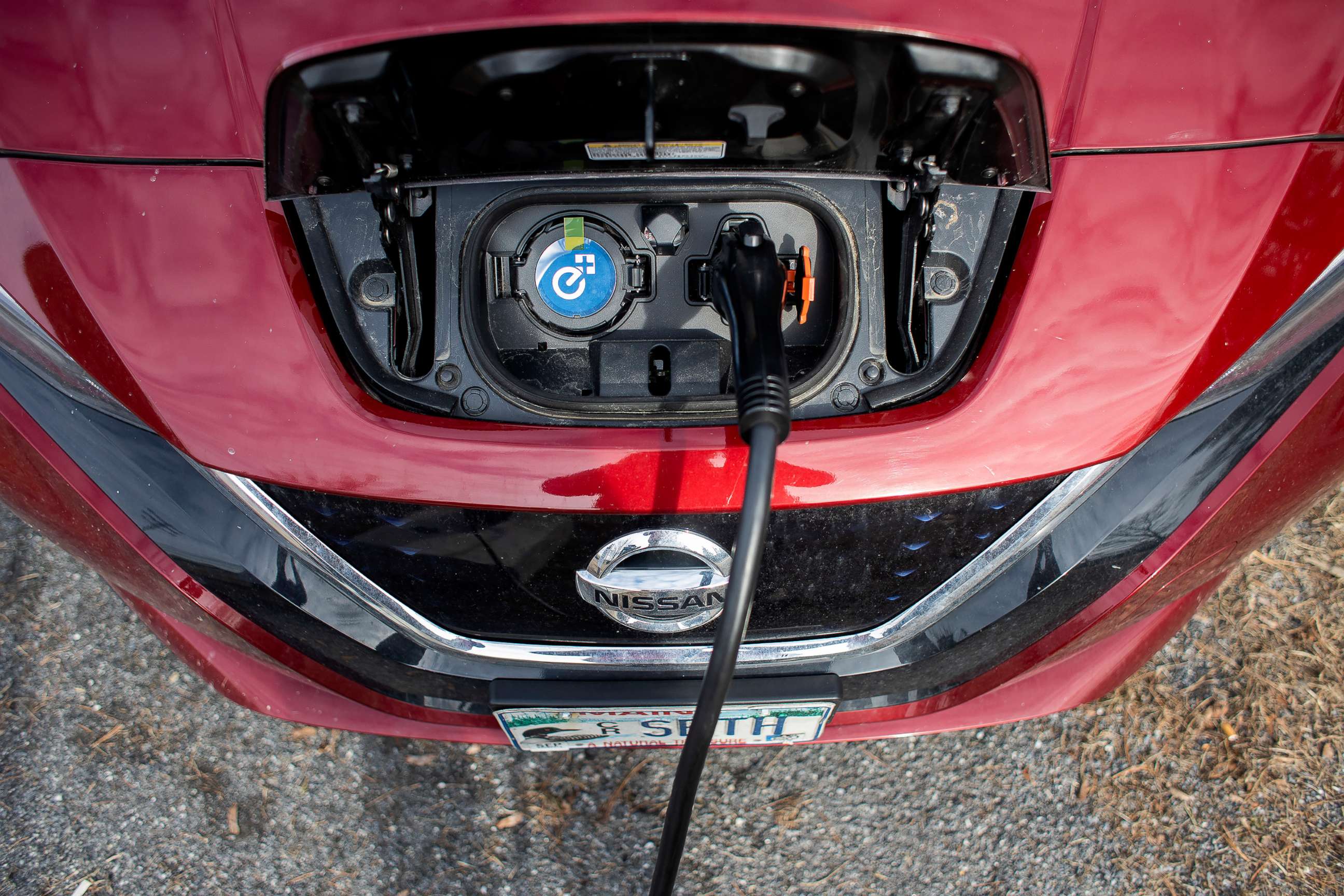 PHOTO: A Nissan Leaf gets charged at a level II EV charging station in Brunswick, Maine, March 9, 2020. 