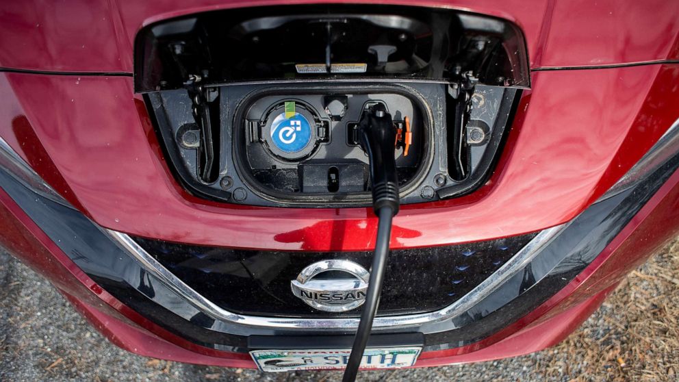 PHOTO: A Nissan Leaf gets charged at a level II EV charging station in Brunswick, Maine, March 9, 2020. 
