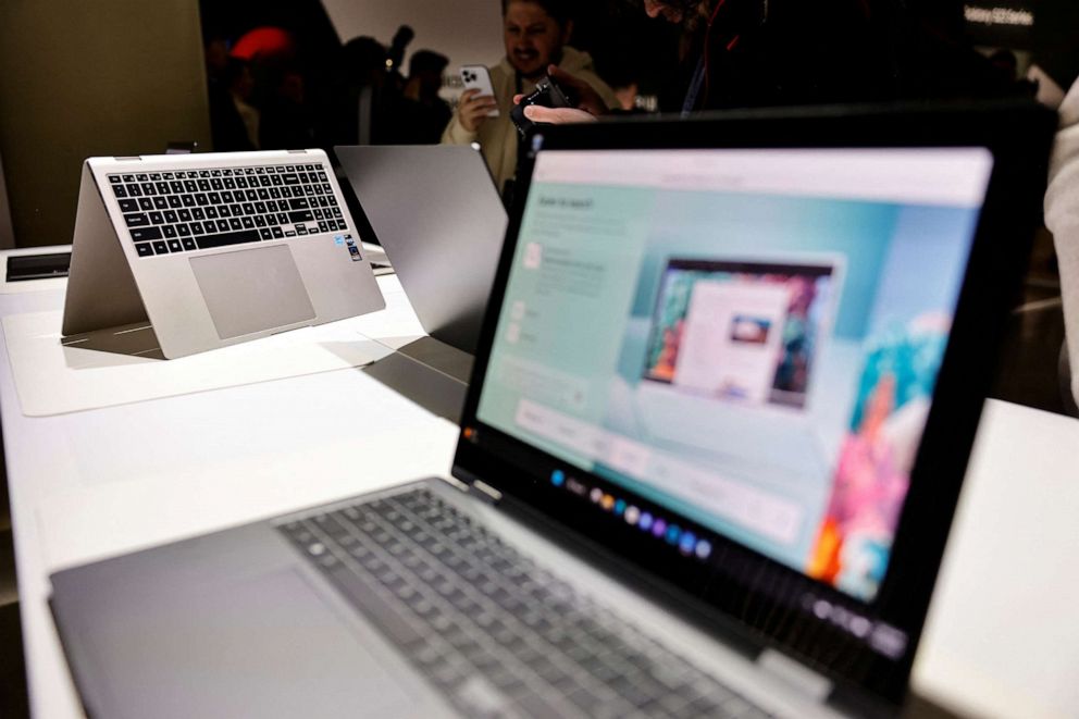 PHOTO: Attendees get their first look at the new Galaxy Book3 series laptops as Samsung Electronics unveils its latest flagship smartphones in San Francisco, February 1, 2023.