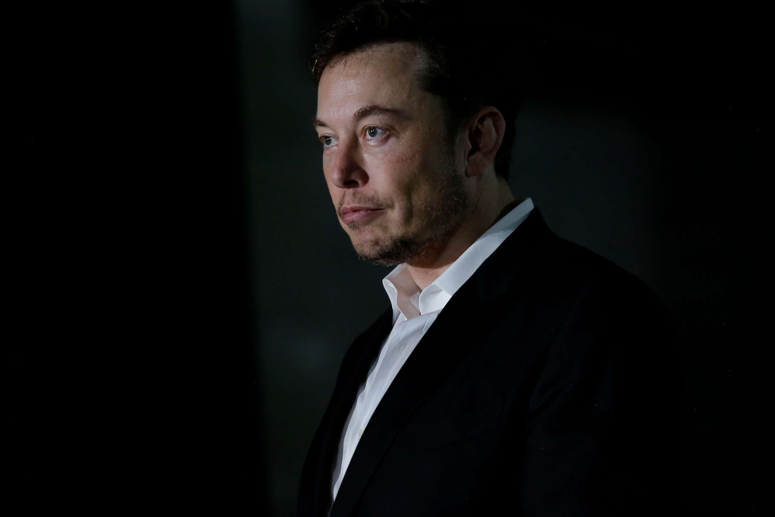 PHOTO: TEngineer and tech entrepreneur Elon Musk of The Boring Company listens as Chicago Mayor Rahm Emanuel talks about constructing a high-speed transit tunnel at Block 37 during a news conference, June 14, 2018, in Chicago.