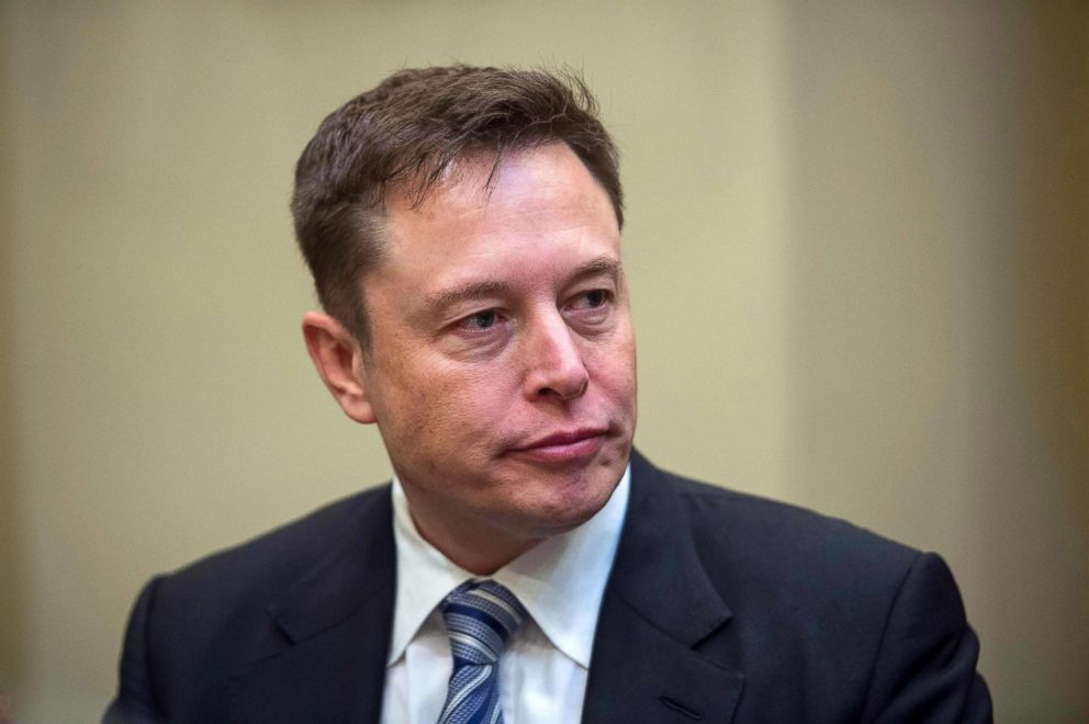 PHOTO: CEO Elon Musk listens to President Donald Trump speak during a meeting with business leaders in the Roosevelt Room at the White House in Washington, DC., Jan. 23, 2017.