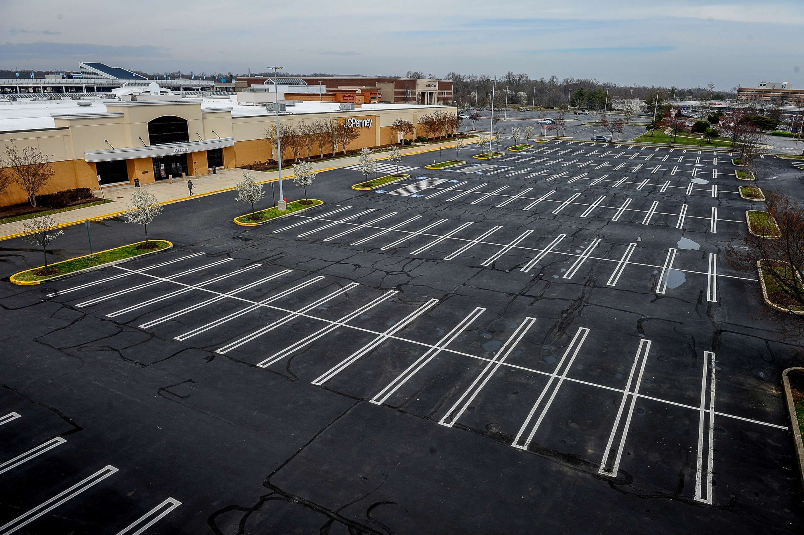PHOTO: An almost empty parking lot at a shopping mall in Annapolis, Md., after all malls were closed to prevent the spread of coronavirus disease (COVID-19), March 19, 2020.