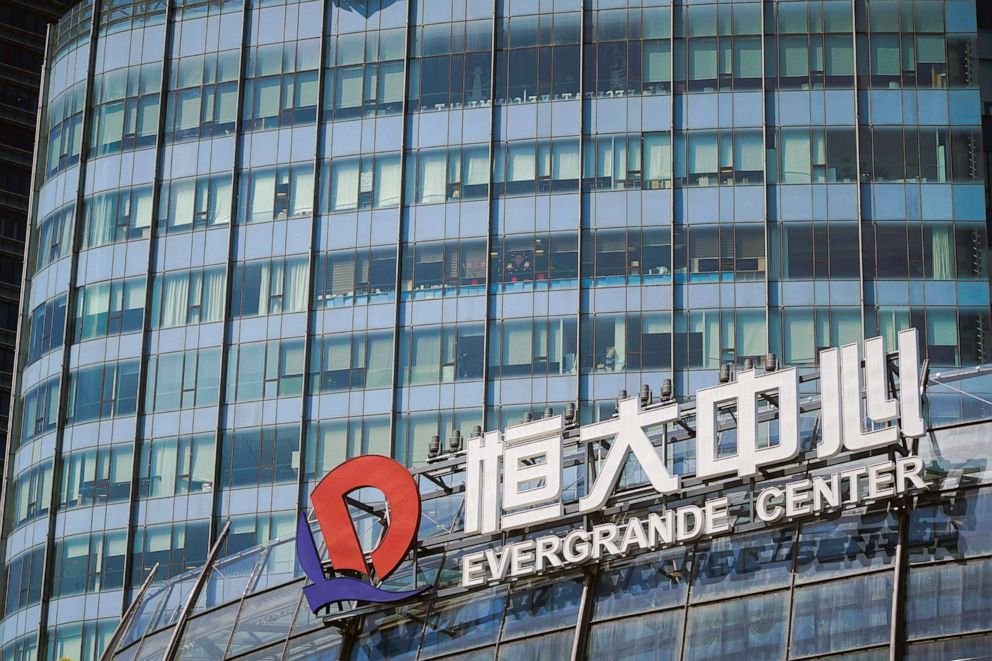 PHOTO: China Evergrande Group is seen on the Evergrande Center in Shanghai, Sept.22, 2021.