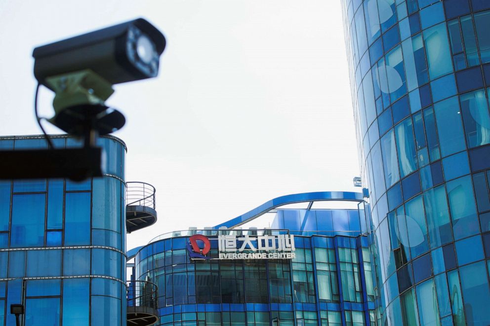 PHOTO: China Evergrande Group is seen on the Evergrande Center in Shanghai, Sept.22, 2021.