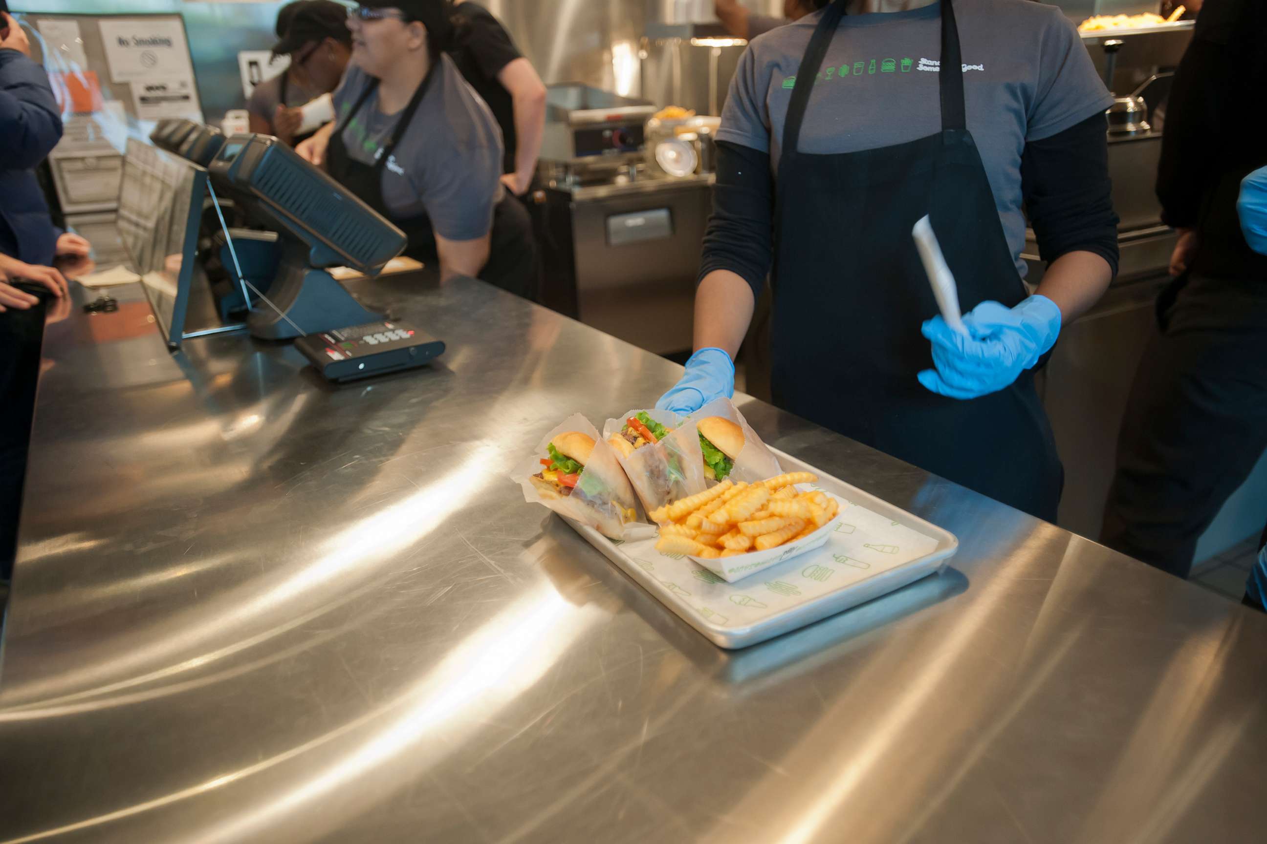 PHOTO: In this Dec. 20, 2011, file photo, orders are picked up at the Shake Shack in Downtown Brooklyn in New York.