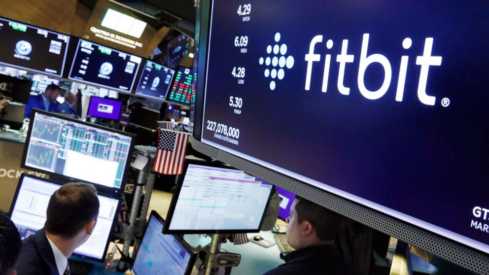PHOTO: The logo for fItbit appears above a trading post on the floor of the New York Stock Exchange,  Oct. 28, 2019.