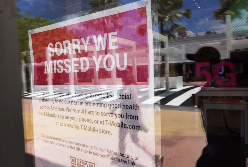 PHOTO: A sign reading, "Sorry we missed you," is seen in a store on The Lincoln Road Mall as the majority of businesses remain closed due efforts to contain COVID-19 on May 8, 2020 in Miami Beach, Fla.