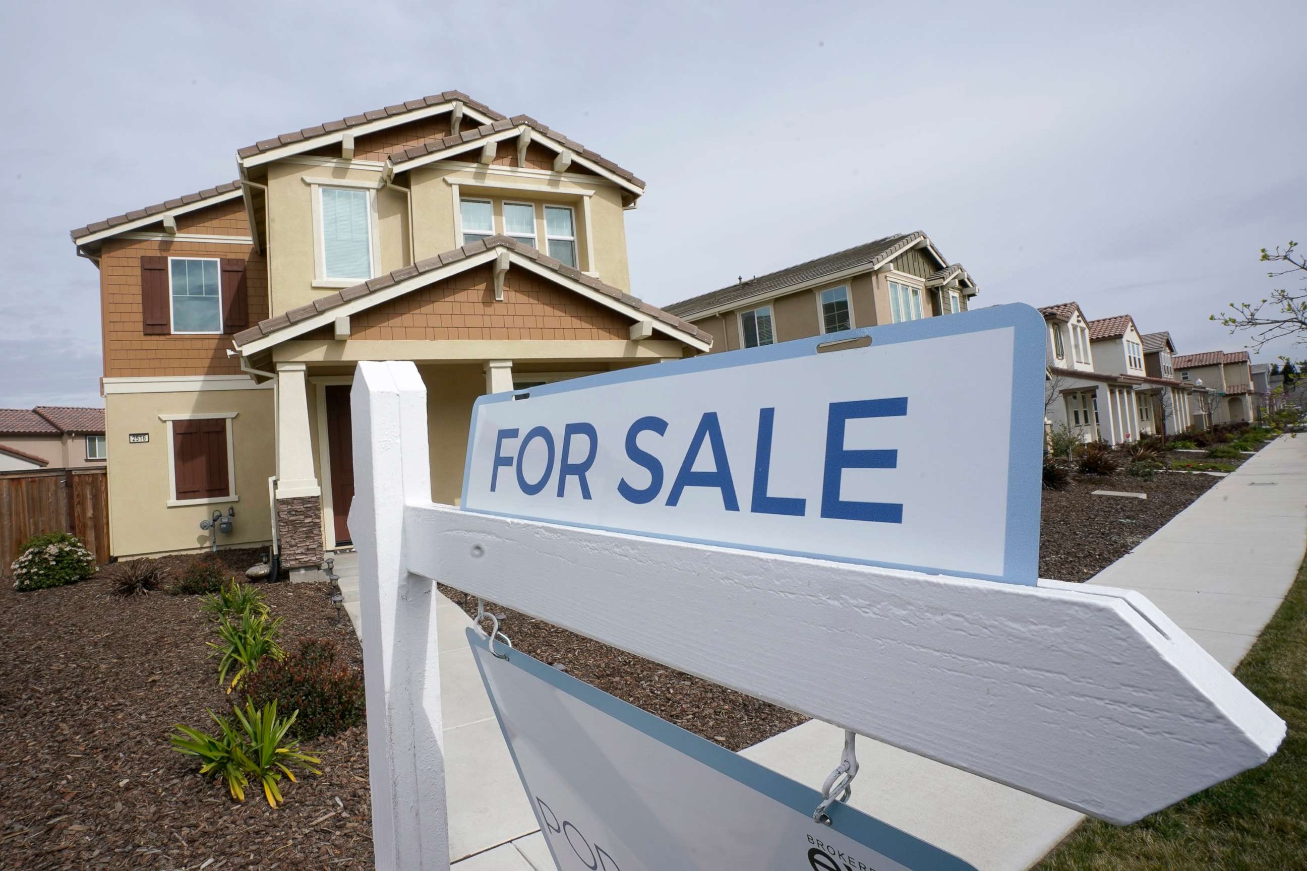 PHOTO: In this March 3, 2022, file photo, a for sale sign is posted in front of a home in Sacramento, Calif.