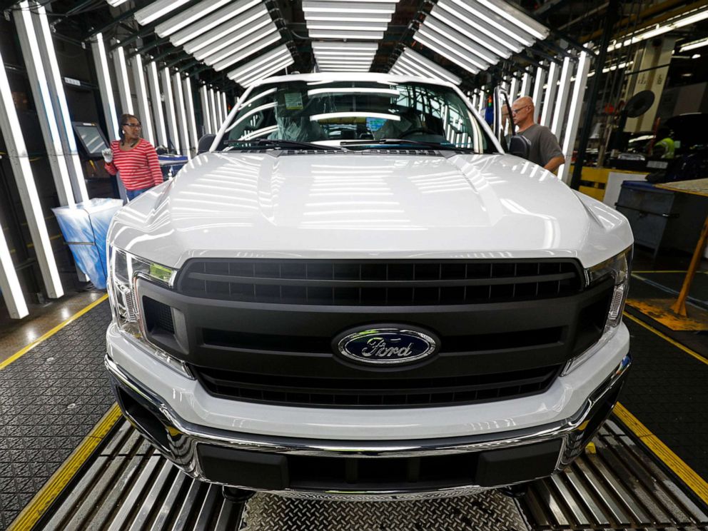 PHOTO: Ford F150 trucks go through the customer acceptance line at the Ford Truck Plant in Dearborn, Mich., Sept. 27, 2018.