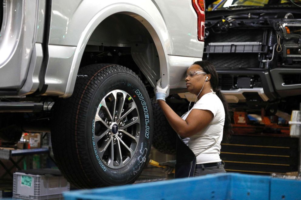 PHOTO: A Ford Motor Company worker works on a Ford F150 truck on the assembly line at the Ford Dearborn Truck Plant, Sept. 27, 2018, in Dearborn, Michigan.