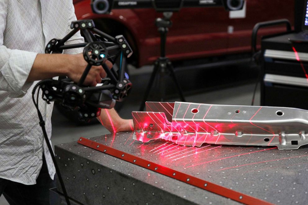 PHOTO: A Ford Motor Company worker operates a Creaform laser scanning measuring device at the Ford Dearborn Truck Plant, Sept. 27, 2018, in Dearborn, Michigan.