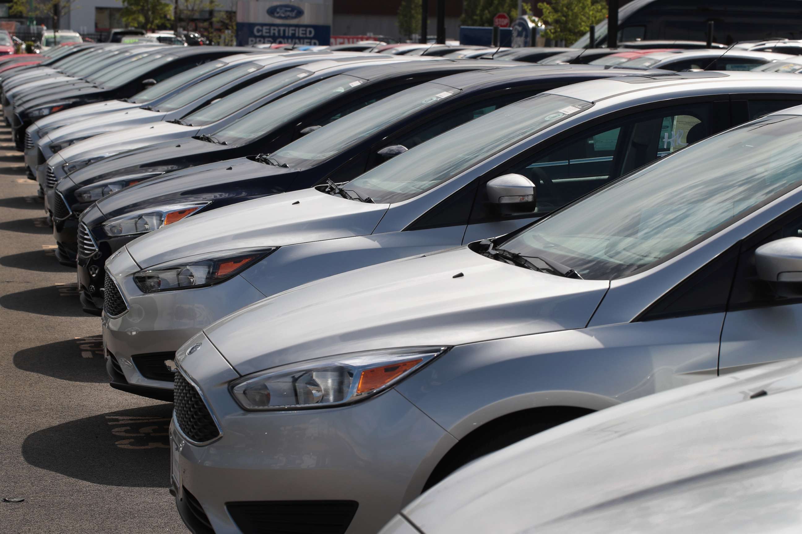 PHOTO: Ford Focus compact cars for sale at a dealership in Chicago, June 20, 2017.