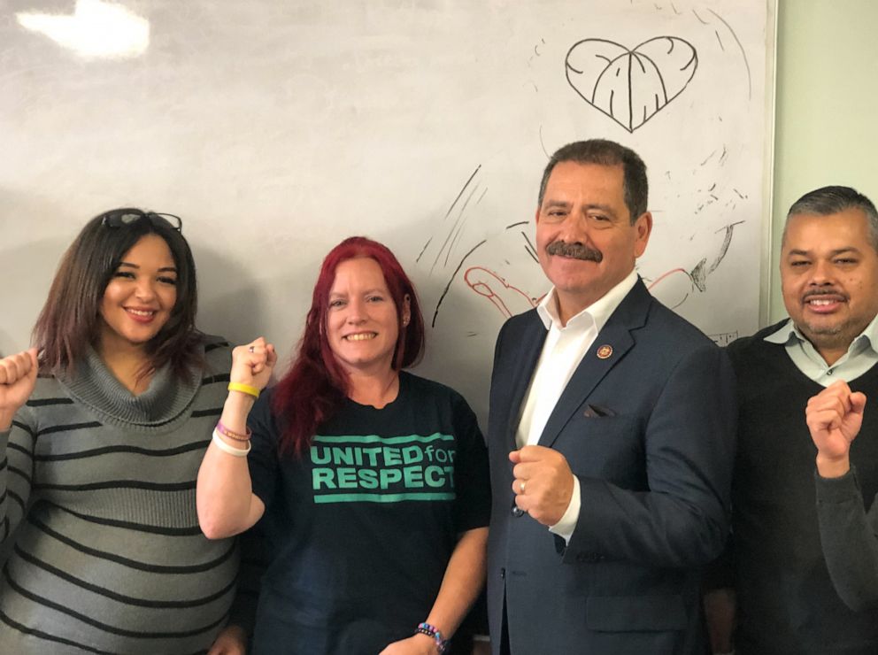 PHOTO: Congressman Jesus Garcia poses for a picture with "United for Respect" members, November 2019.