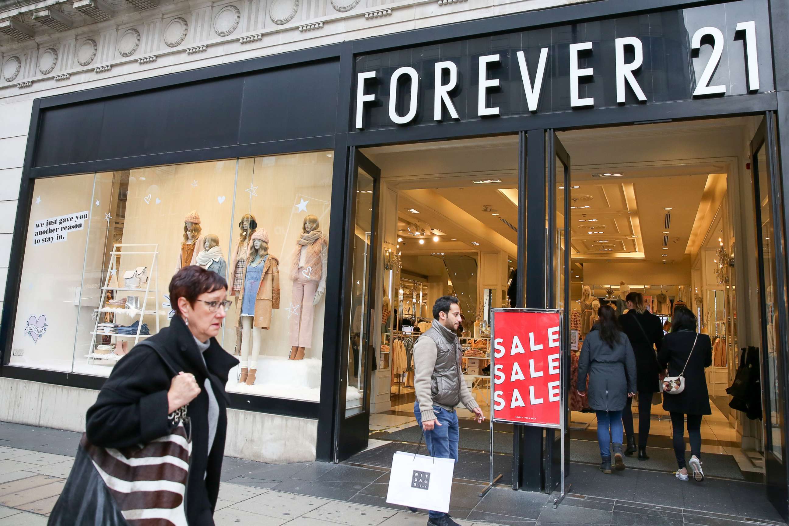 PHOTO: Shoppers are seen outside Forever 21 store on London's Oxford Street, in 2018.