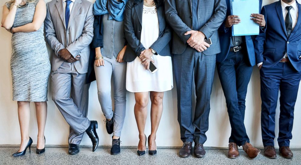 PHOTO: People stand in line while waiting to be interviewed in this undated stock photo.