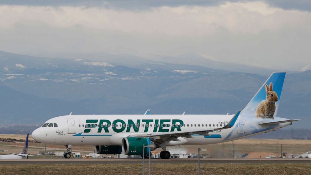 PHOTO: In this file photo a Frontier Airlines jetliner taxis to a runway to take off from Denver International Airport, April 23, 2020, in Denver.