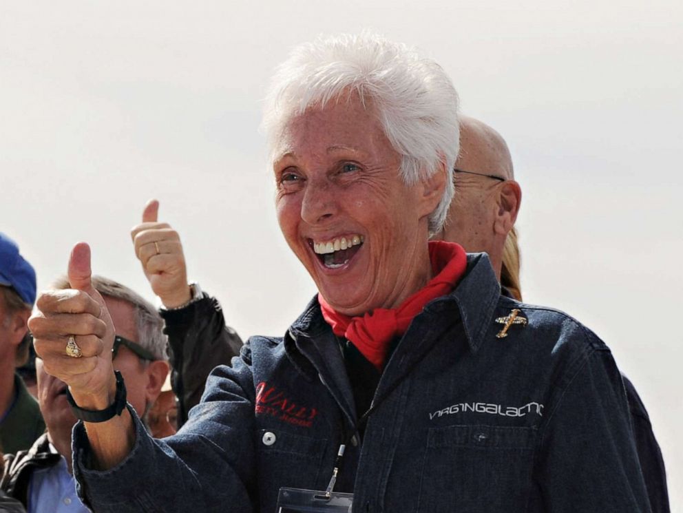 PHOTO: Wally Funk, right, celebrates before the Virgin Galactic VSS Enterprise spacecraft makes it's first public landing during the Spaceport America runway dedication ceremony near Las Cruces, New Mexico on Oct. 22, 2010.