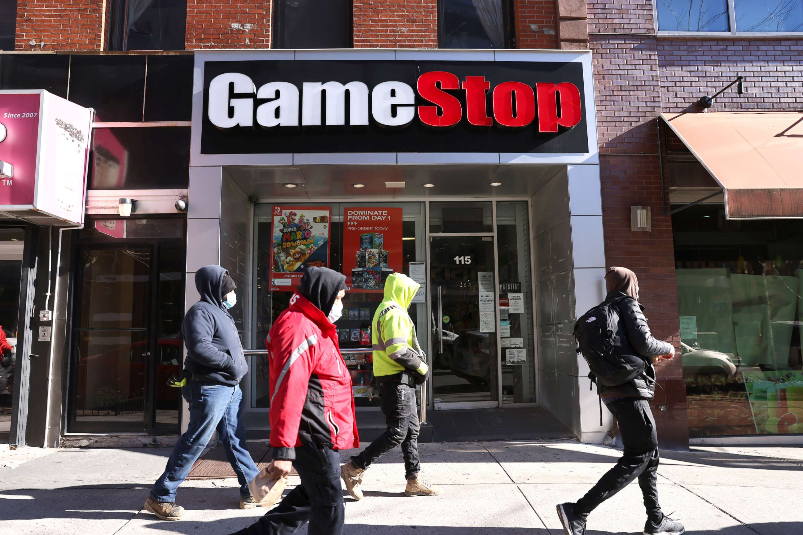 PHOTO: People walk by a GameStop store in Brooklyn on Jan. 28, 2021 in New York City.