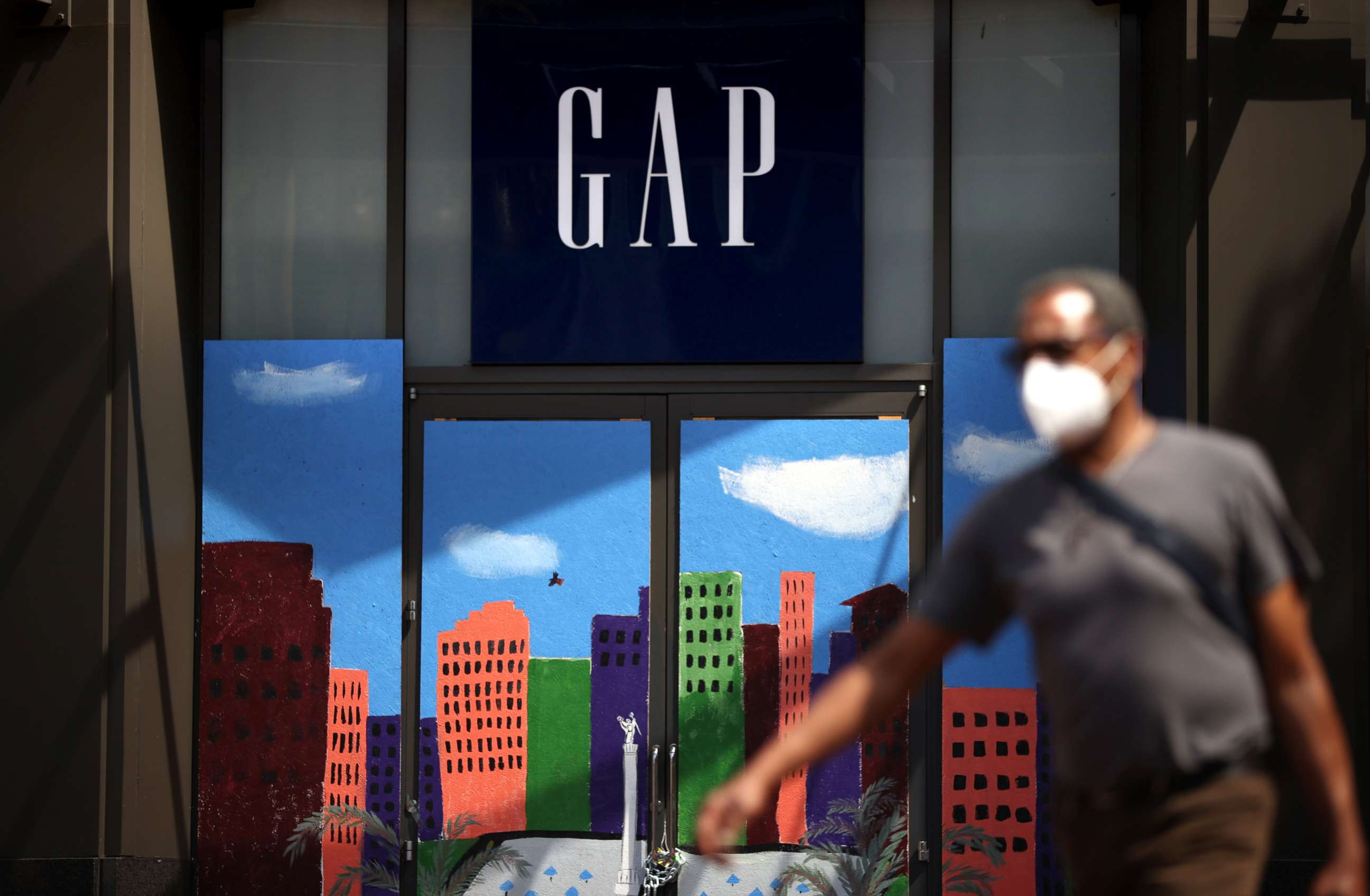 PHOTO: A pedestrian walks by a GAP store on Aug. 18, 2020, in San Francisco.