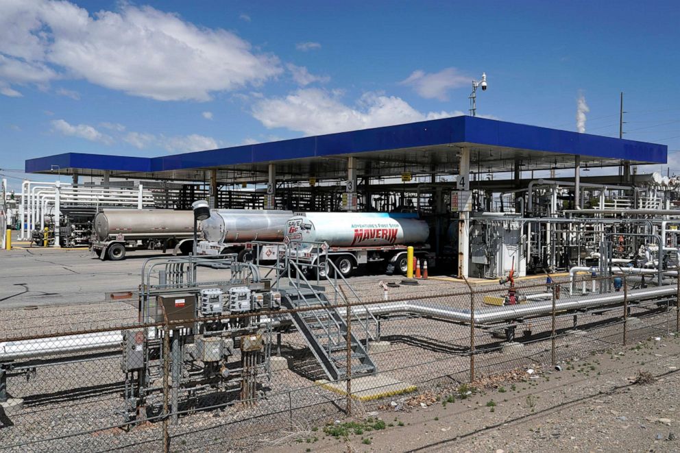 PHOTO: Trucks line up to fill their tankers with gas and diesel to deliver to stations at Marathon Refinery, May 24, 2022, in Salt Lake City, Utah.