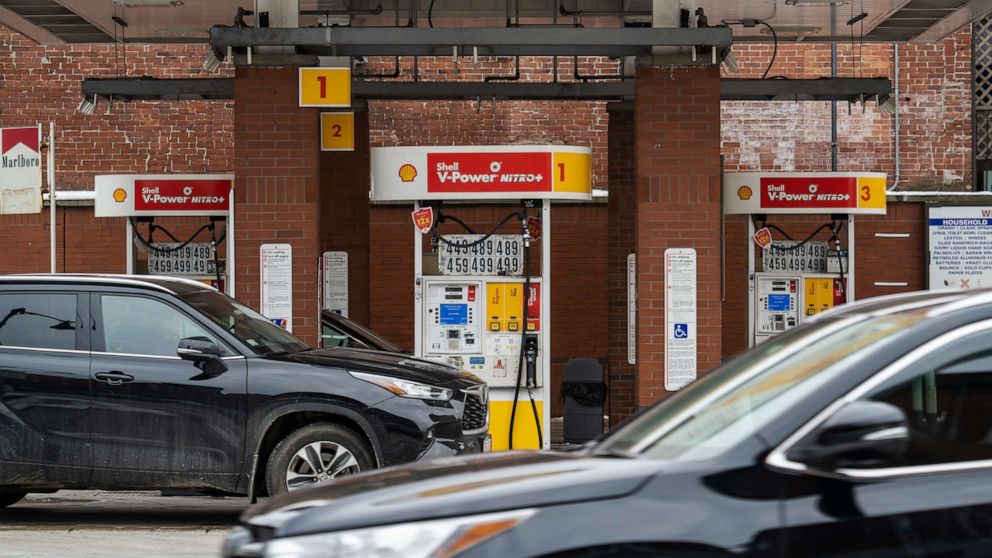 Photo: Vehicles fill up at a Shell gas station in Boston on March 1, 2022. 