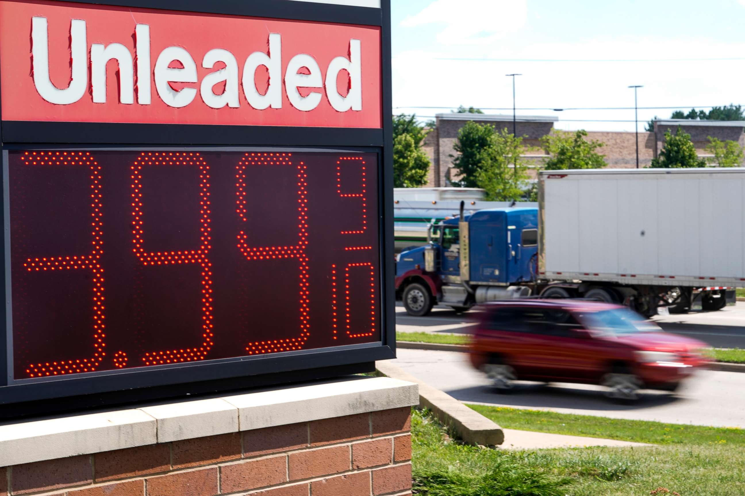 PHOTO: The price of regular unleaded gas is advertised for just under $4 a gallon at a Woodman's, Wednesday, July 20, 2022, in Menomonie Falls, Wis.