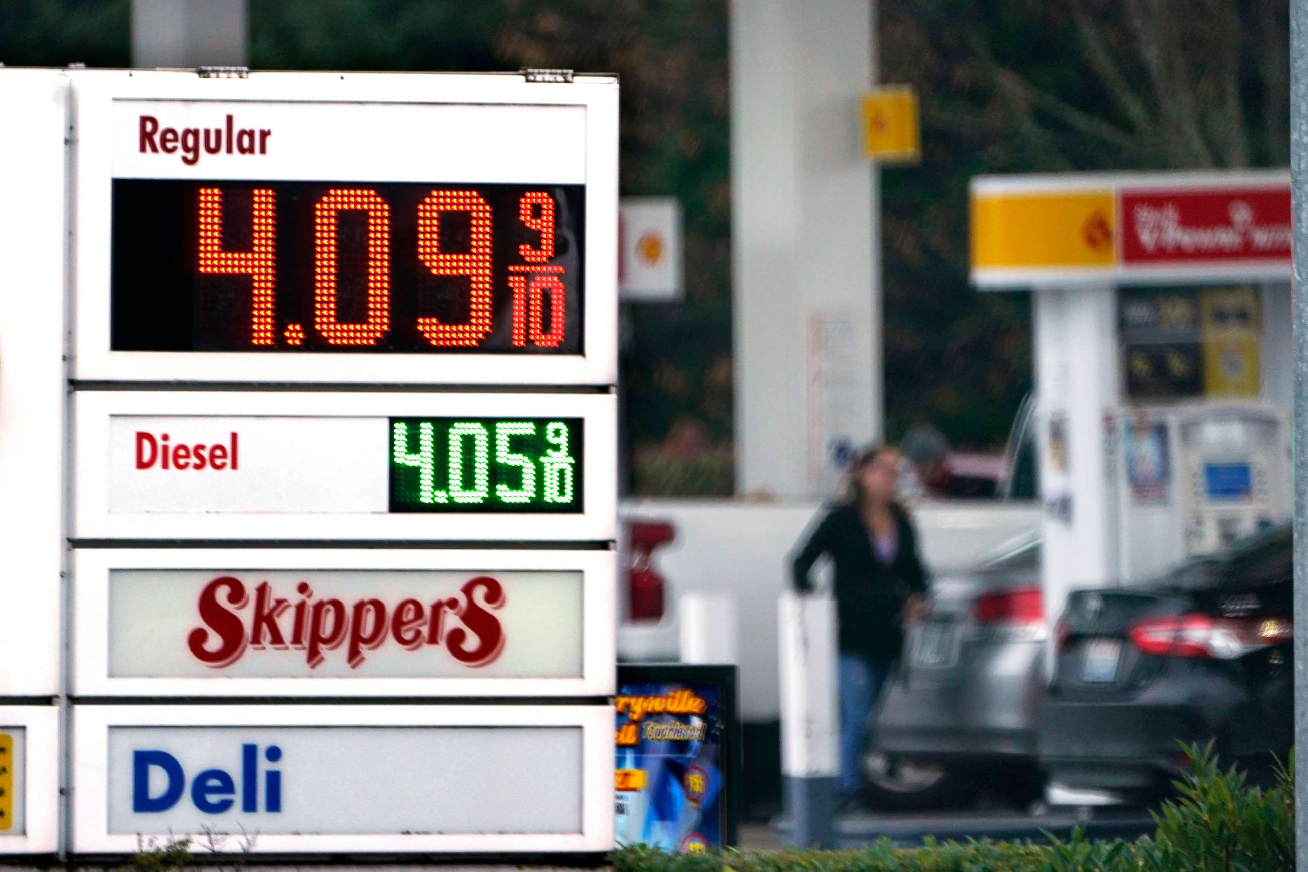 PHOTO: A driver fills a tank at a gas station, Dec. 10, 2021, in Marysville, Wash.  