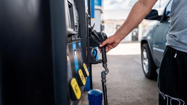A person pumps gas at a Valero gas station on June 30, 2025, in Austin, Texas. 