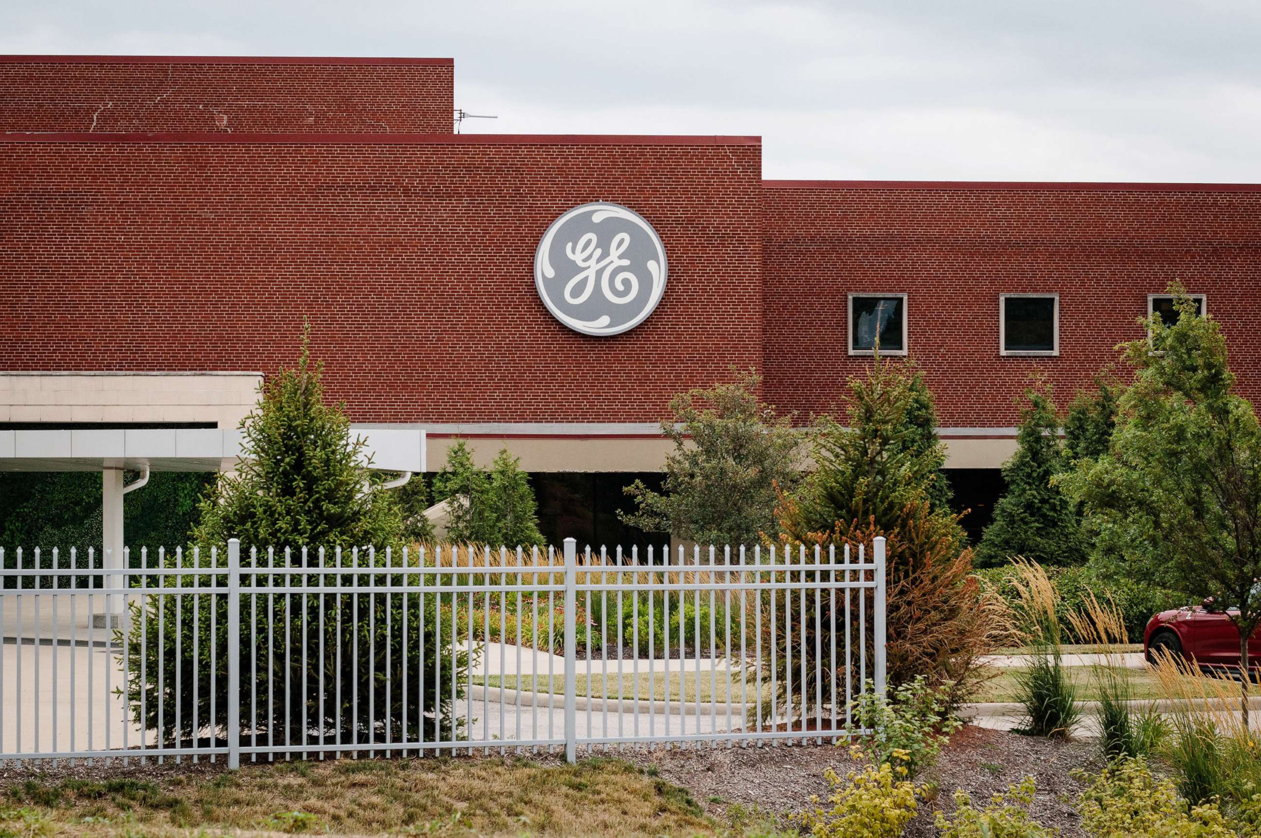 PHOTO: A logo is displayed outside of a GE Aviation, a subsidiary of General Electric Co., facility in Cincinnati, July 16, 2020.