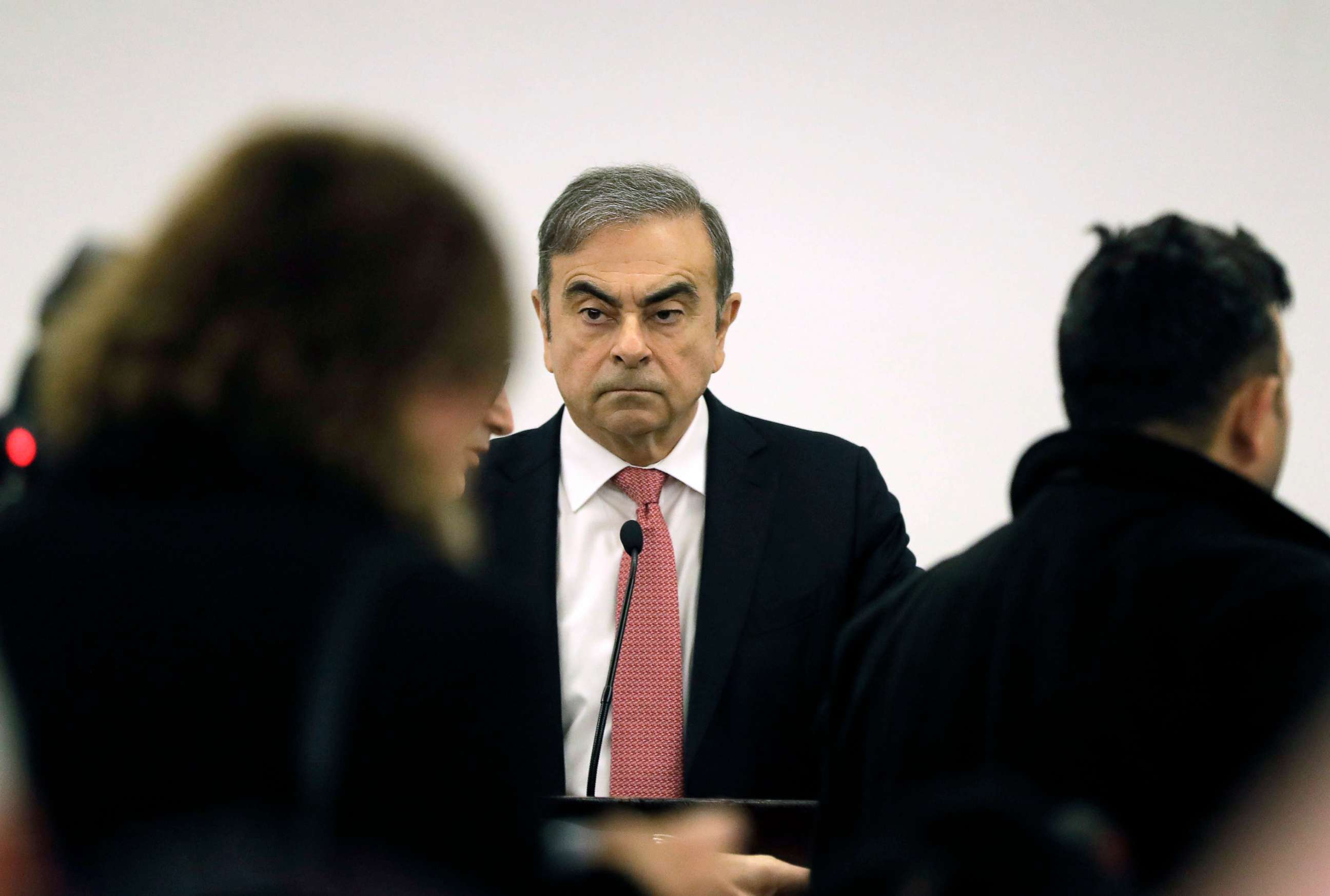 PHOTO: Former Renault-Nissan boss CEO Carlos Ghosn addresses a large crowd of journalists on his reasons for dodging trial in Japan, where he is accused of financial misconduct, at the Lebanese Press Syndicate in Beirut, Jan. 8, 2020. 