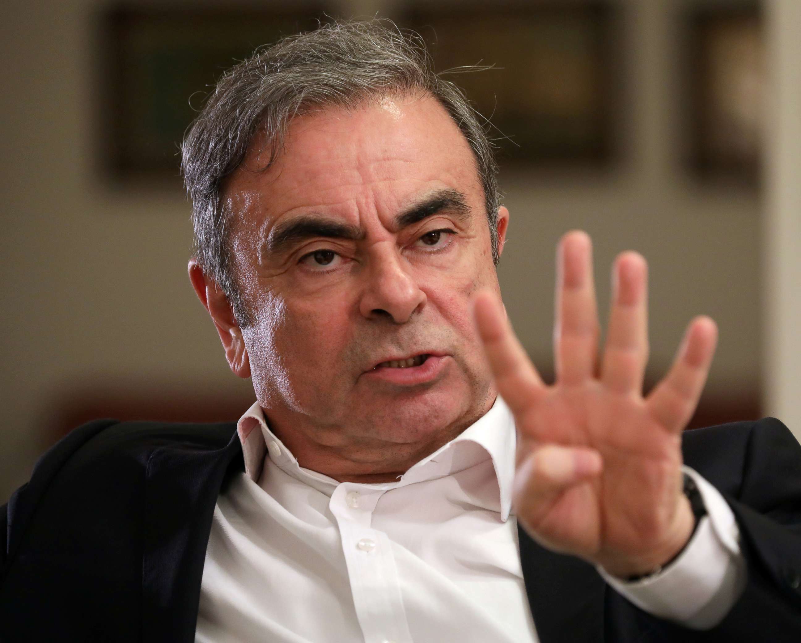 PHOTO: Former Nissan chairman Carlos Ghosn talks during an interview with Reuters in Beirut, Lebanon Jan. 14, 2020. 