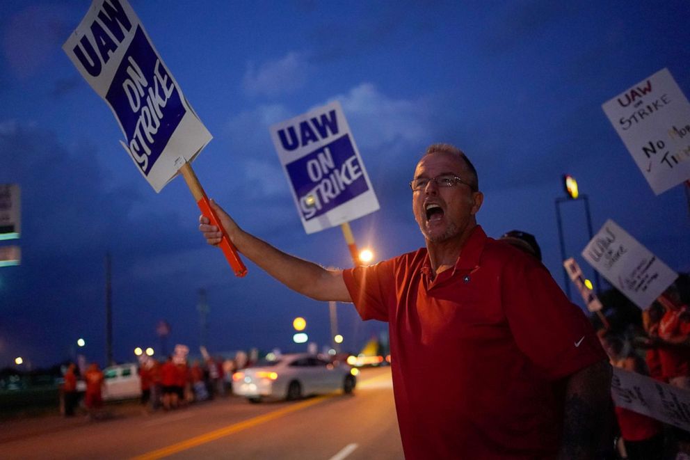 PHOTO: Charlie Highlanger, 59, a GM employee shouts at passing employees entering the assembly plant outside the General Motors Bowling Green plant during the United Auto Workers (UAW) national strike in Bowling Green, Kentucky, Sept. 20, 2019.