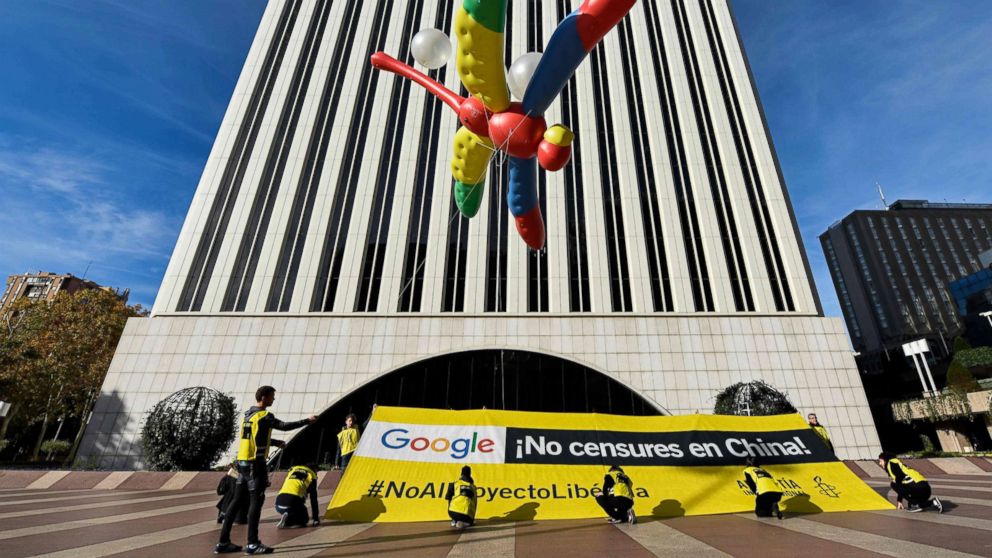 PHOTO: Amnesty International activists hold a giant dragonfly-shaped balloon with a banner reading "Google, do not censor in China, no to the Dragonfly project" during a protest outside the Google headquarters in Madrid, Nov. 27, 2018.