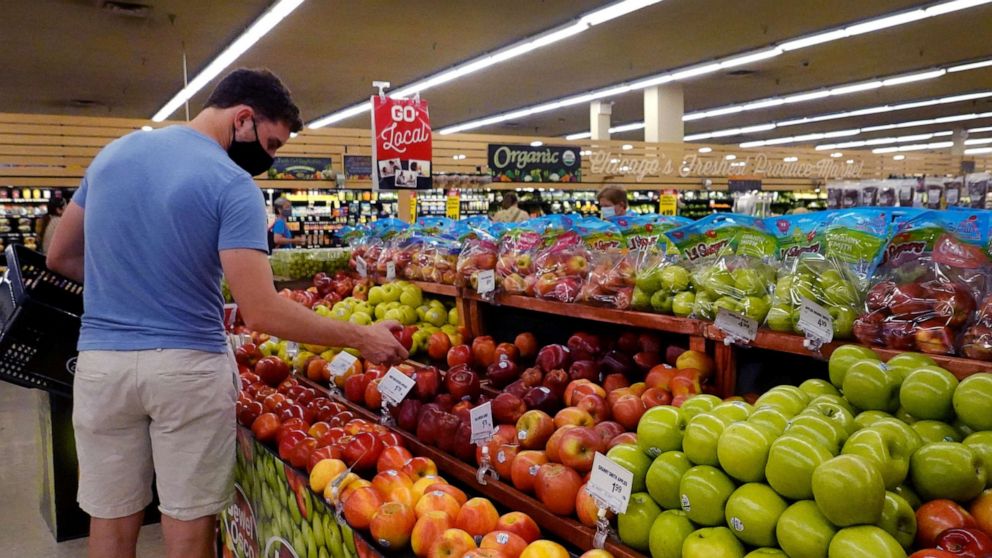 PHOTO: Customers shop for produce at a supermarket on June 10, 2021 in Chicago.