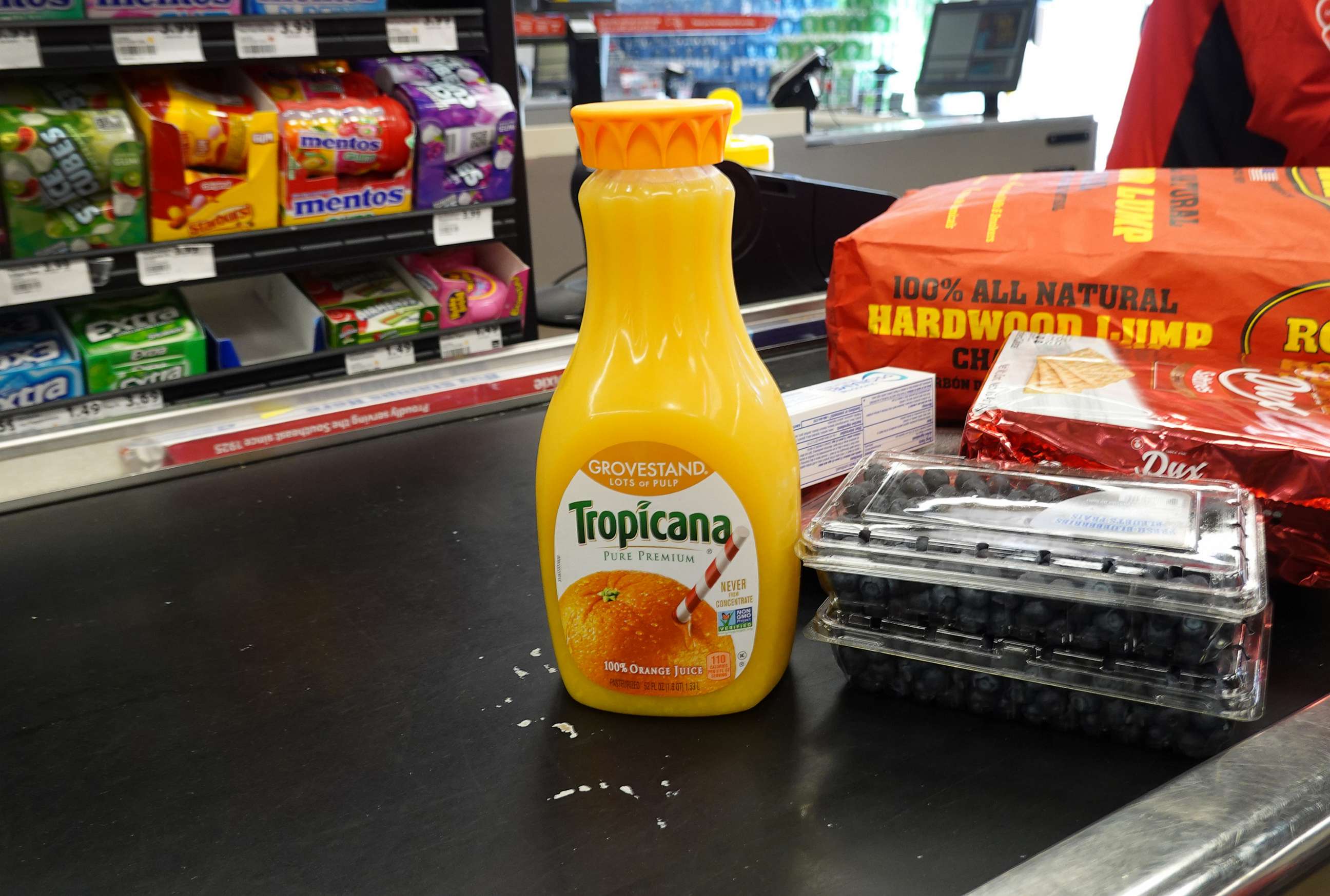 PHOTO: A bottle of orange juice sits at the checkout counter of a grocery store on January 19, 2023 in Miami, Florida.