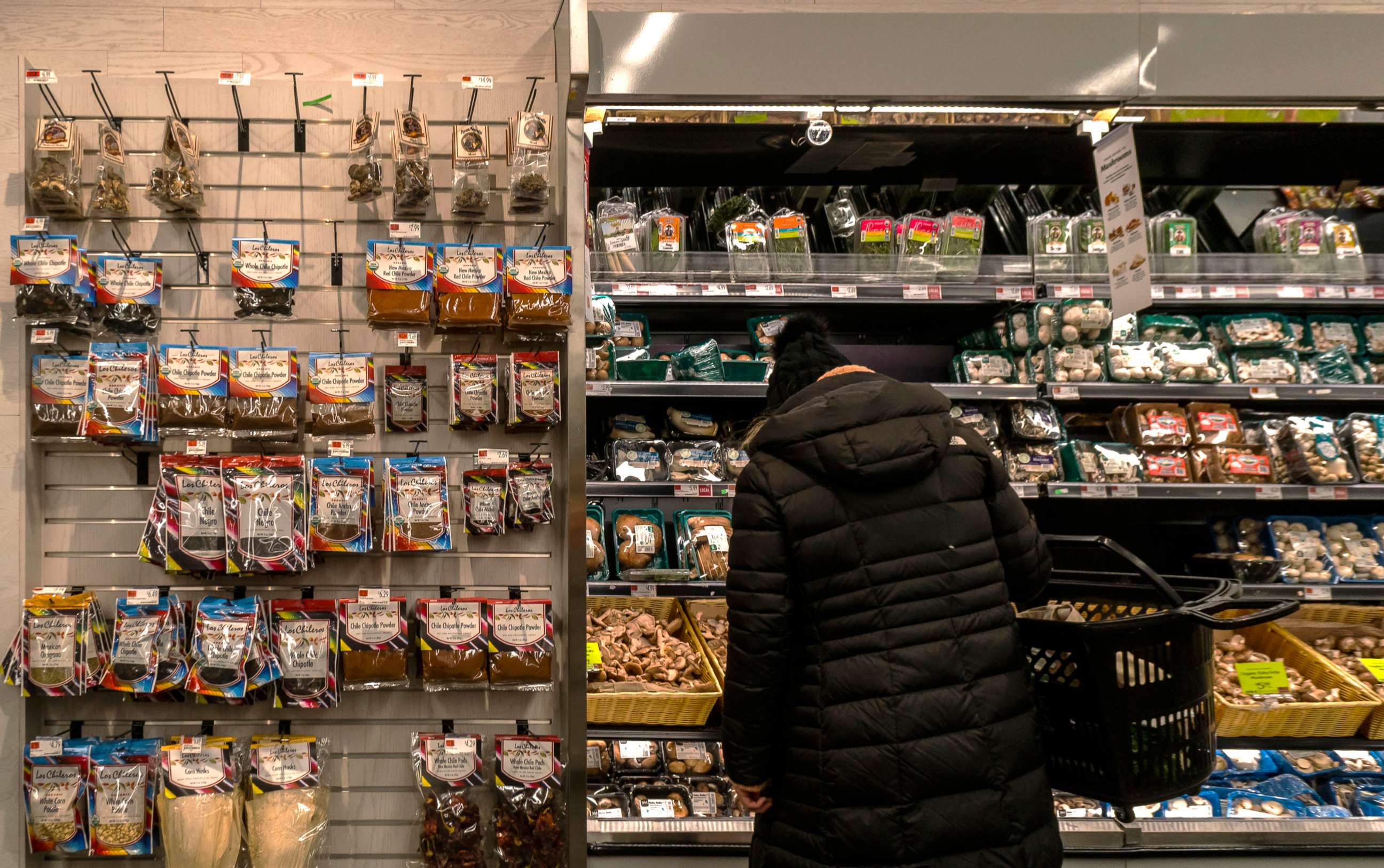PHOTO: A shopper looks for produce in a Whole Foods Market supermarket in New York on Jan. 9, 2022.