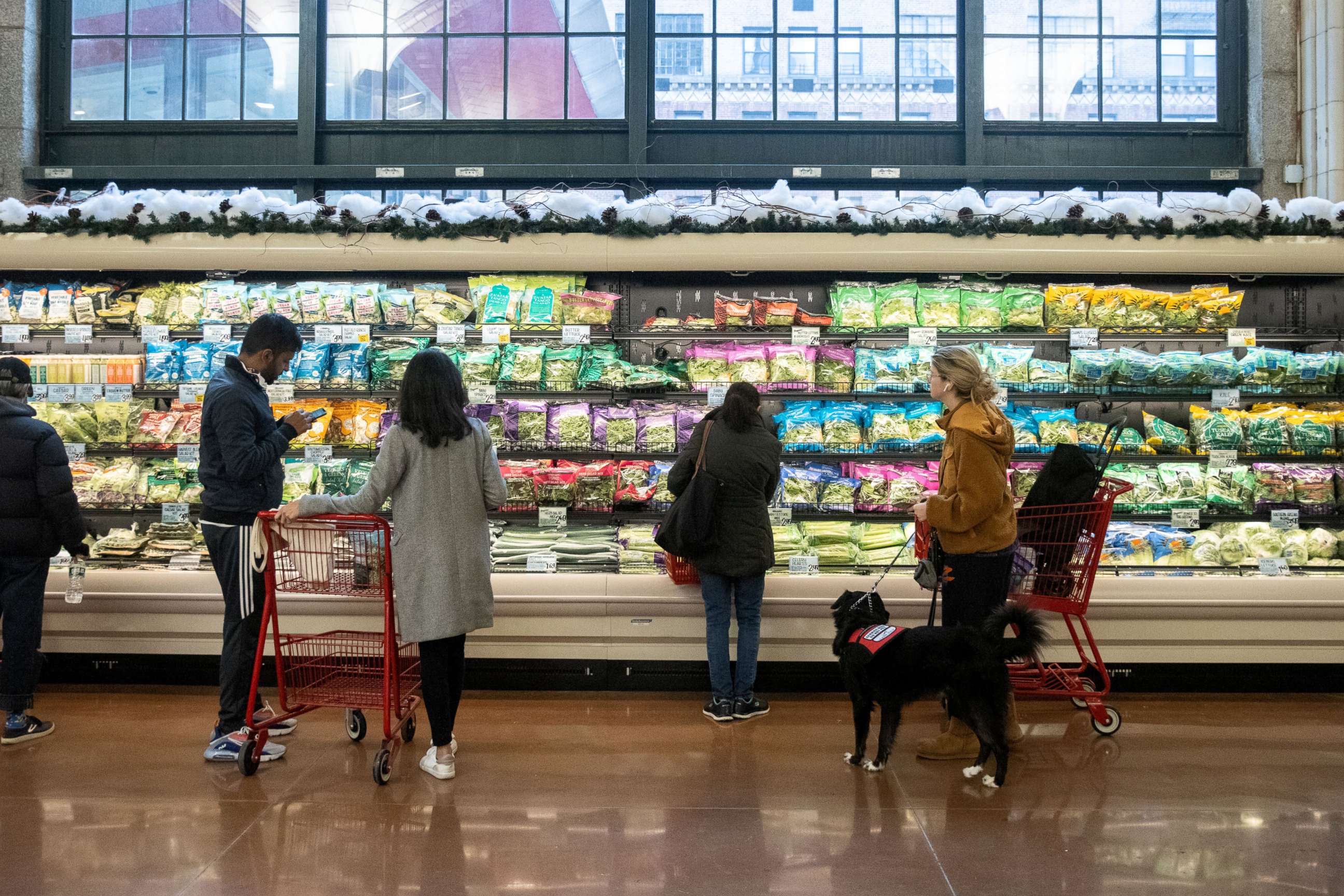 PHOTO: Customers shop at the Trader Joe's Upper East Side Bridgemarket grocery store in New York, Dec. 2, 2021.