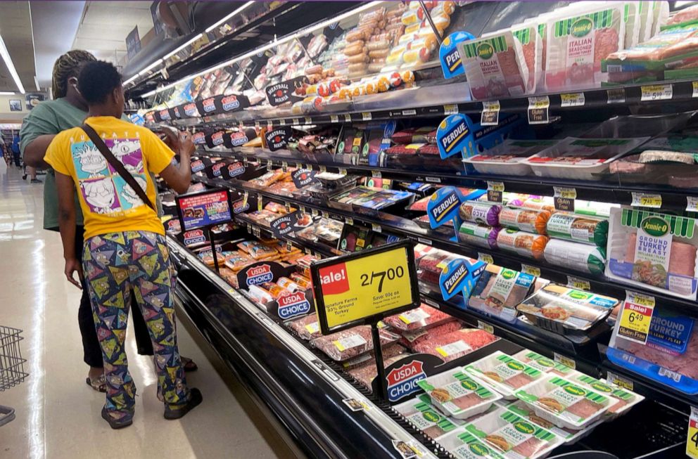 PHOTO: Customers shop for meat at a supermarket on June 10, 2021 in Chicago.