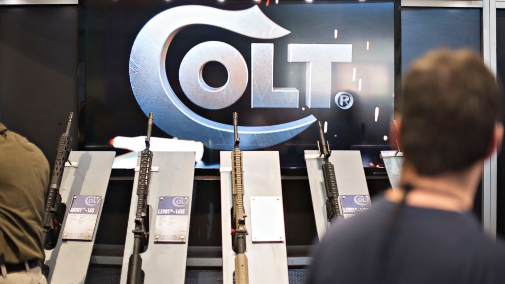 Rifles sit on display in the Colt's Manufacturing Co. booth on the exhibition floor of the 144th National Rifle Association  Annual Meetings and Exhibits,April 11, 2015, in Nashville, Tenn. 
