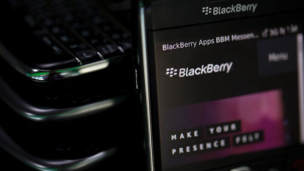 The BlackBerry logo is visible on a BlackBerry smartphone in this photograph taken in London, Sept. 24, 2013. 